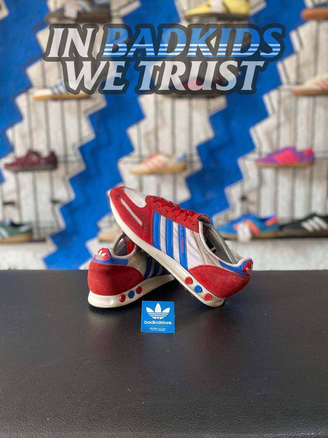 LA Trainer red stripe navy